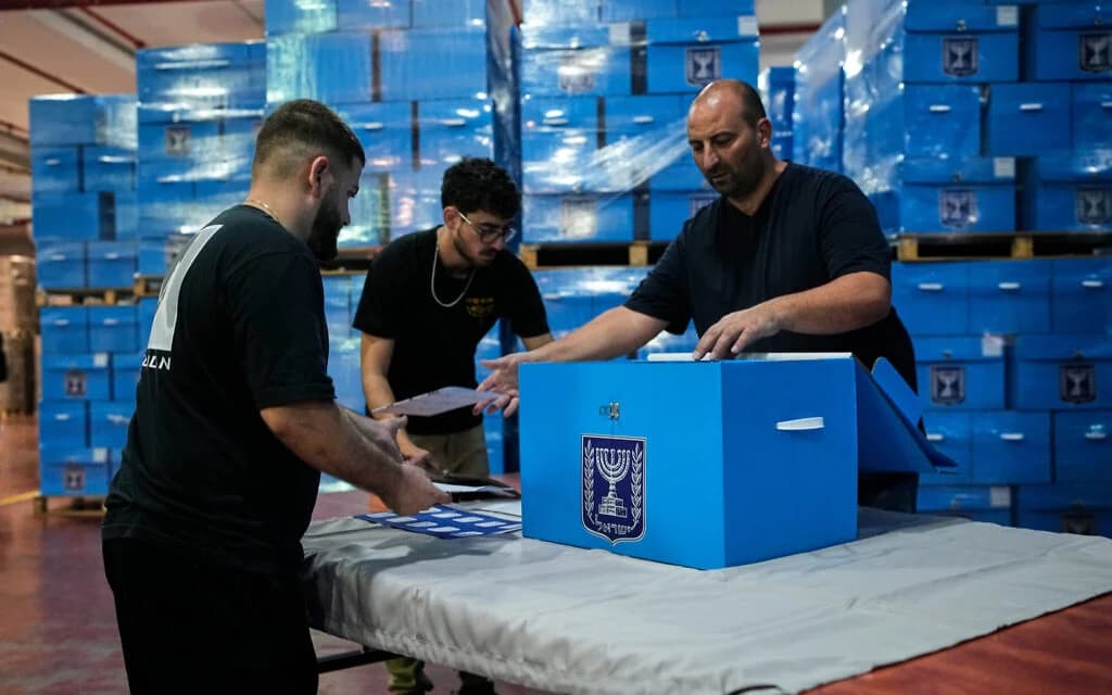 Ballot boxes are prepared for Israel's general election at a logistics center near Shoham