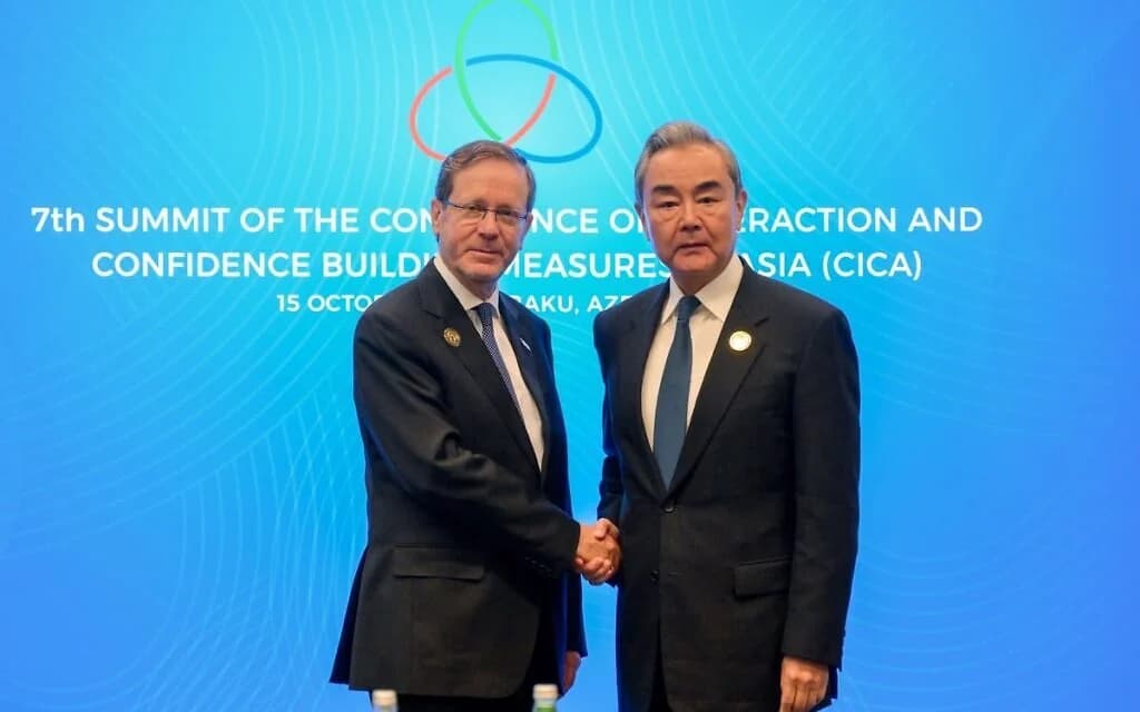 President Isaac Herzog meets with Chinese Foreign Minister Wang Yi in Baku