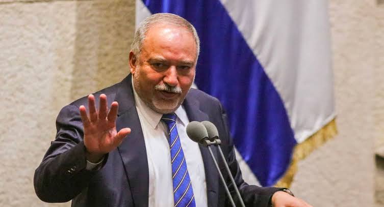 Yisrael Beytenu chairman Avigdor Lieberman speaks at the Knesset podium