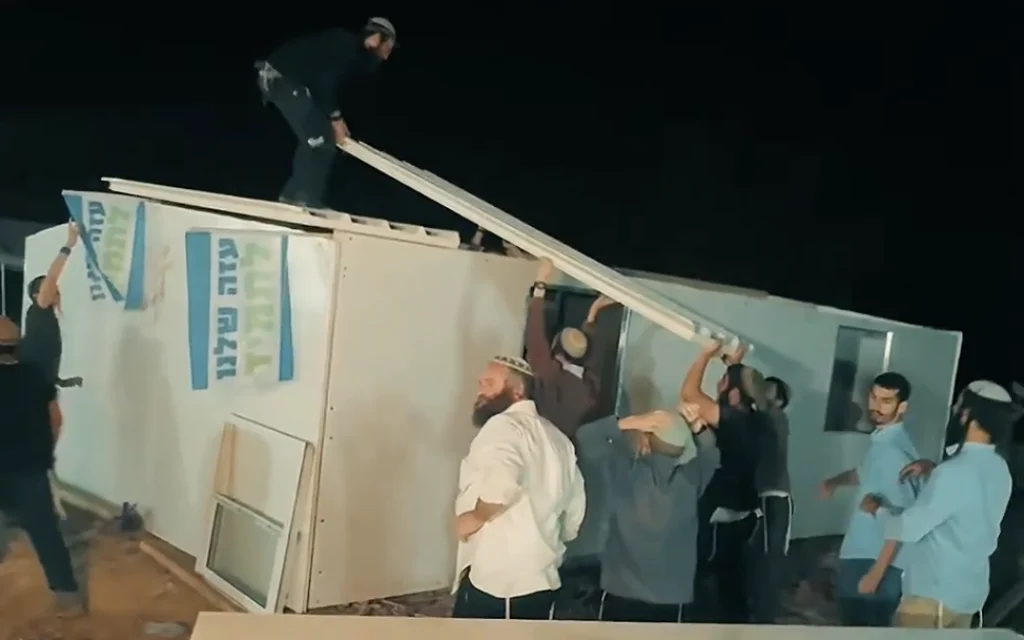 Activists build a structure at the 'Pioneers of Gaza' settlement point near the Gaza border